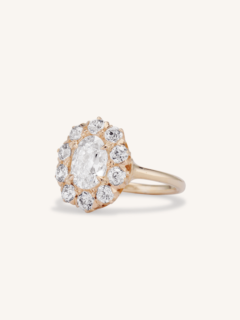 Edwardian 1.13 Carat Oval Shaped Diamond Cluster Engagement Ring