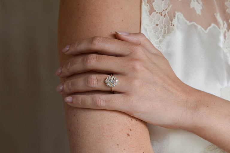 Edwardian 1.13 Carat Oval Shaped Diamond Cluster Engagement Ring