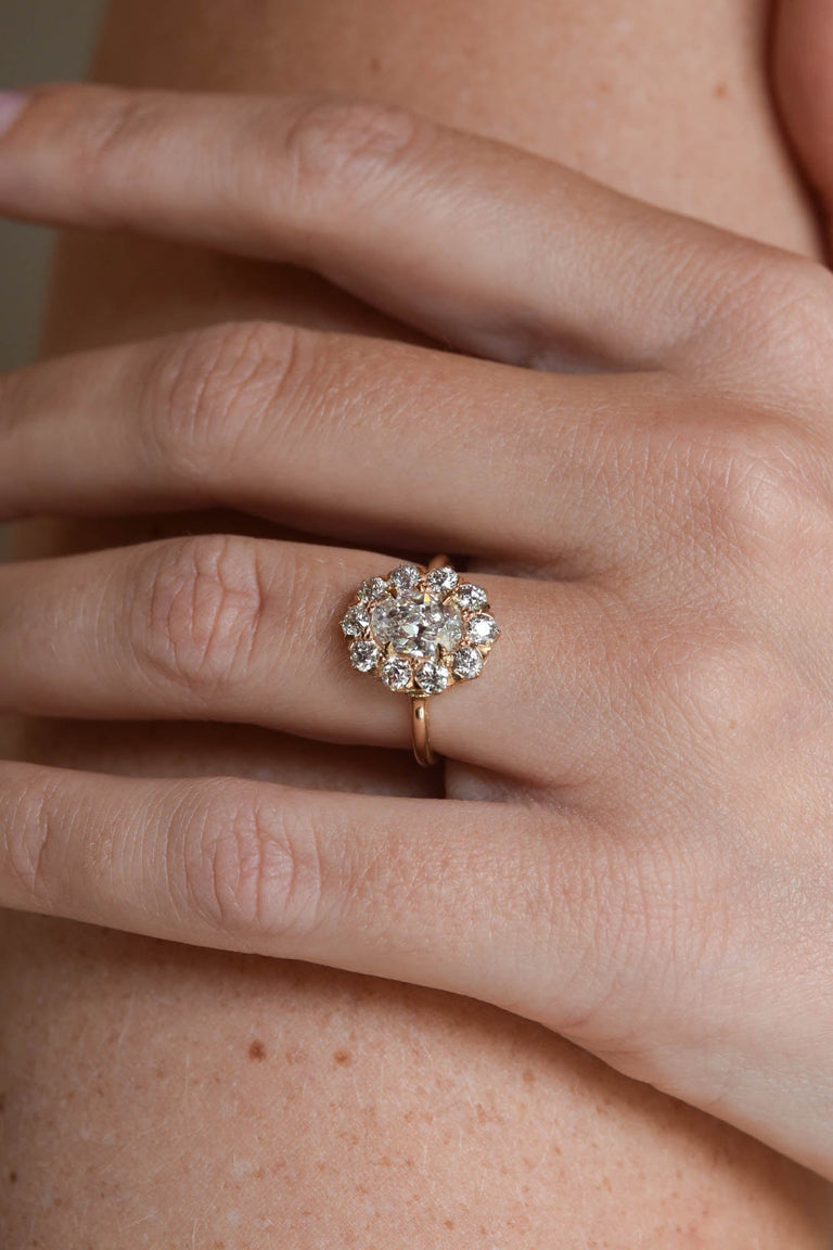 Edwardian 1.13 Carat Oval Shaped Diamond Cluster Engagement Ring