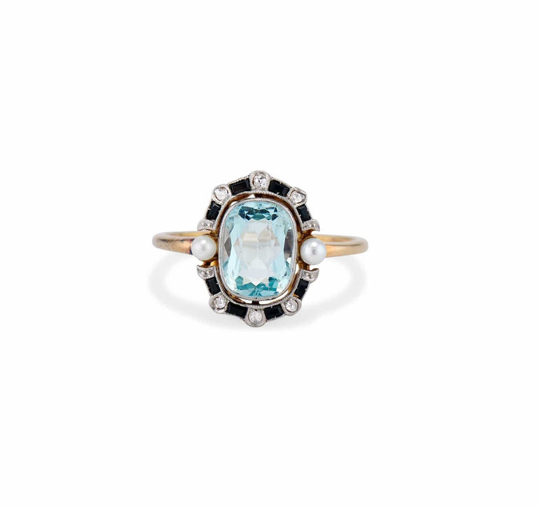 Edwardian 1.40 Carat Aquamarine, Diamond, Onyx, and Pearl Ring