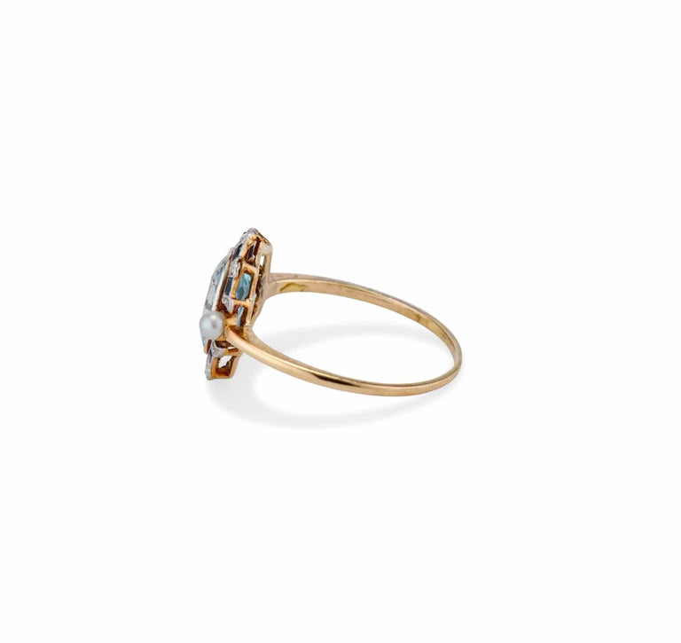 Edwardian 1.40 Carat Aquamarine, Diamond, Onyx, and Pearl Ring