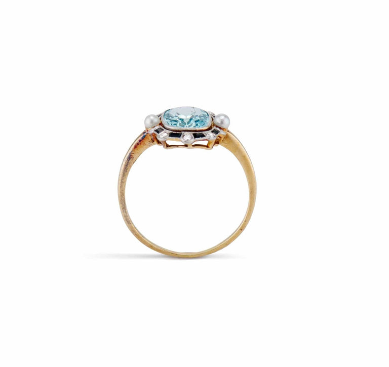 Edwardian 1.40 Carat Aquamarine, Diamond, Onyx, and Pearl Ring