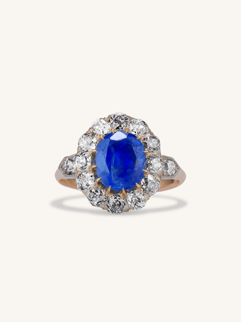 Victorian 3.66 Carat Oval Cut Natural Unheated Ceylon Sapphire and Diamond Antique Cluster Engagement Ring
