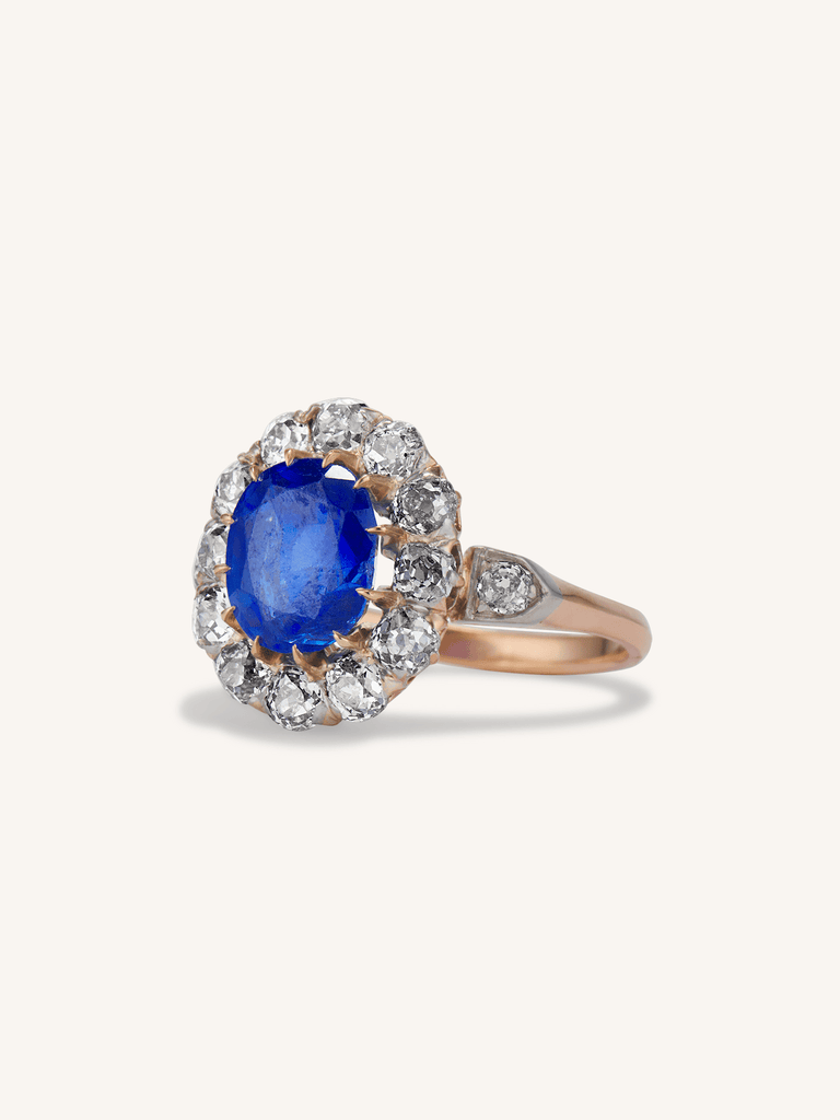 Victorian 3.66 Carat Oval Cut Natural Unheated Ceylon Sapphire and Diamond Antique Cluster Engagement Ring