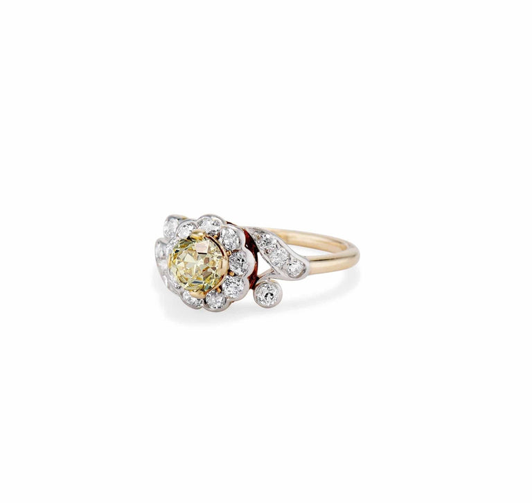 Edwardian .74 Carat Old European Cut Fancy Intense Yellow Diamond Flower Motif Engagement Ring