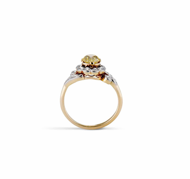 Edwardian .74 Carat Old European Cut Fancy Intense Yellow Diamond Flower Motif Engagement Ring