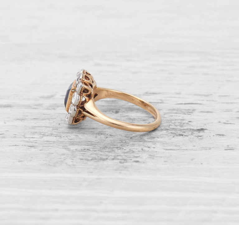 EDWARDIAN SAPPHIRE AND DIAMOND CLUSTER ENGAGEMENT RING