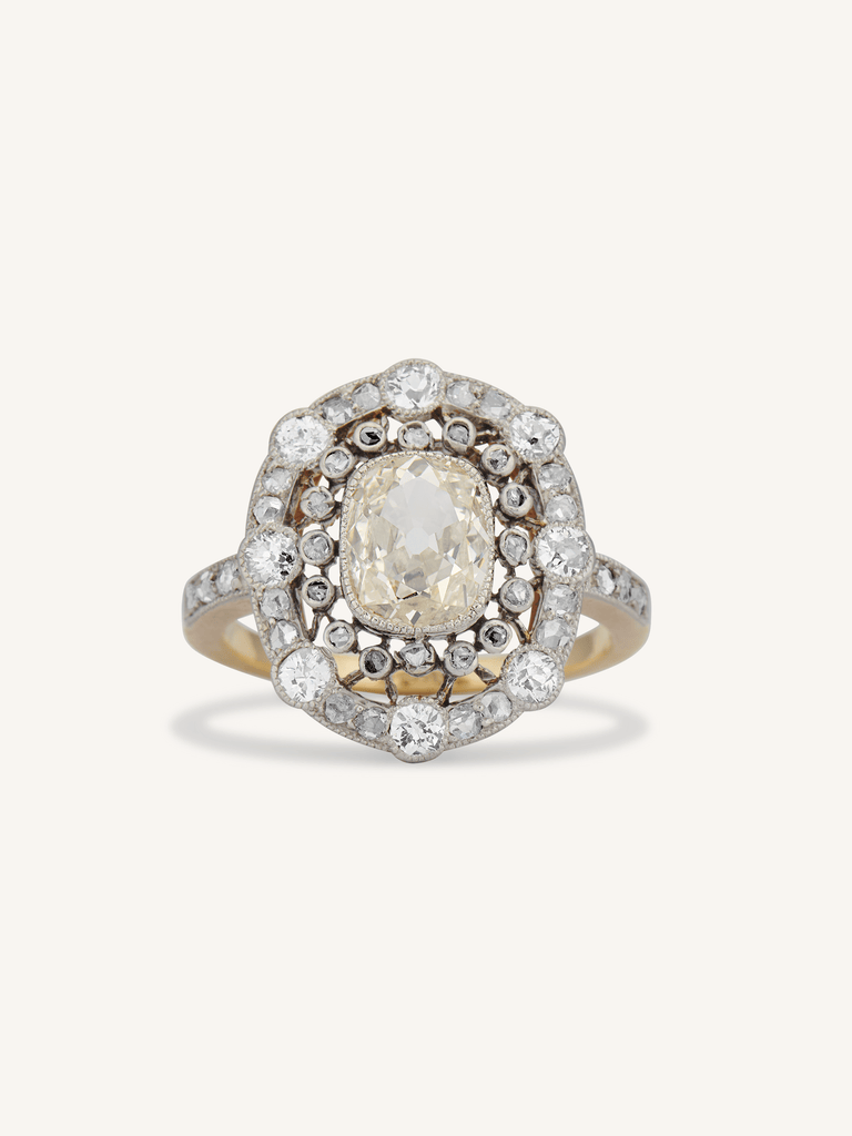 Belle Époque Elongated 1.04 Carat Light Yellow Old Mine Cushion Diamond Cluster Antique Ring, France