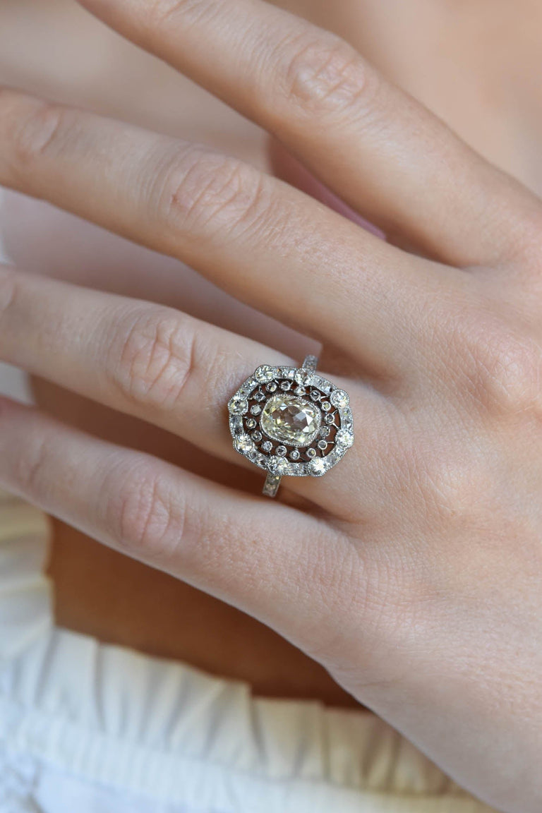 Belle Époque Elongated 1.04 Carat Light Yellow Old Mine Cushion Diamond Cluster Antique Ring, France