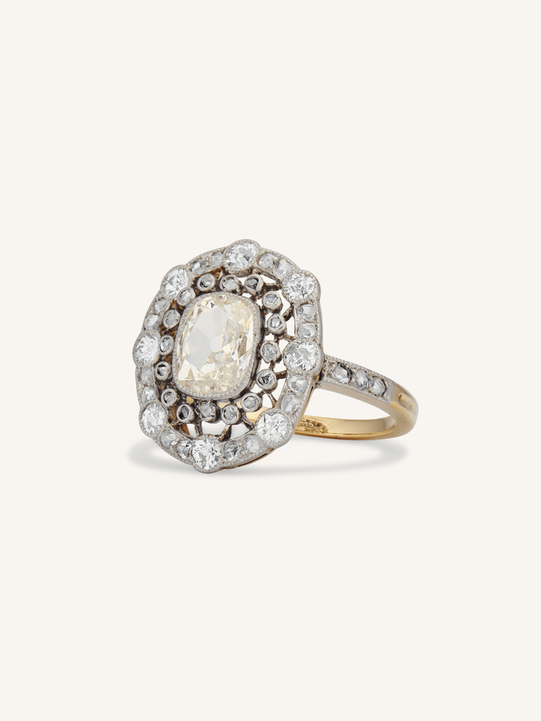 Belle Époque Elongated 1.04 Carat Light Yellow Old Mine Cushion Diamond Cluster Antique Ring, France