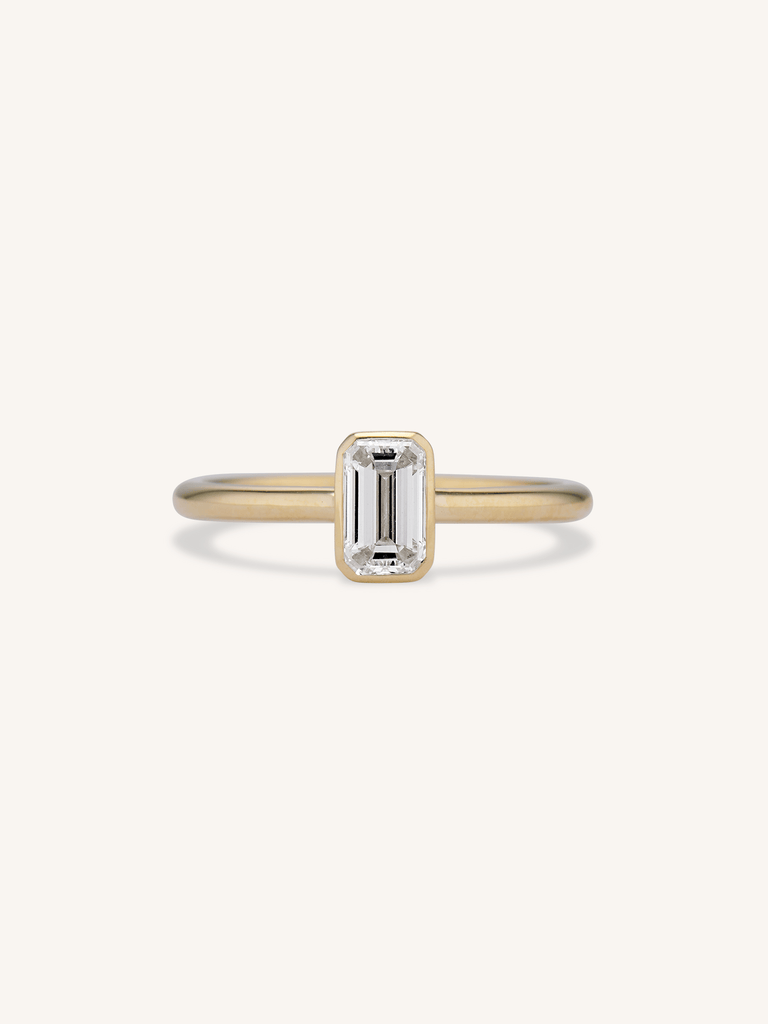 Classic Emerald Cut Diamond Bezel Solitaire .78