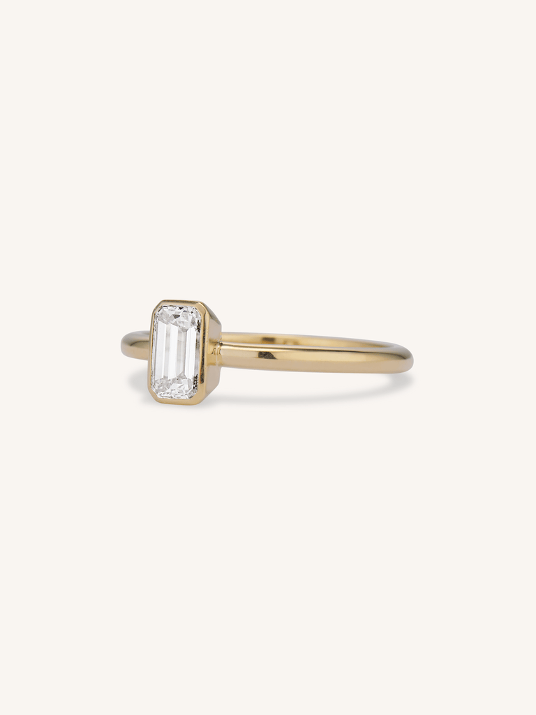 Classic Emerald Cut Diamond Bezel Solitaire .78