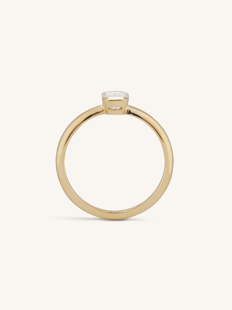 Classic Emerald Cut Diamond Bezel Solitaire .78