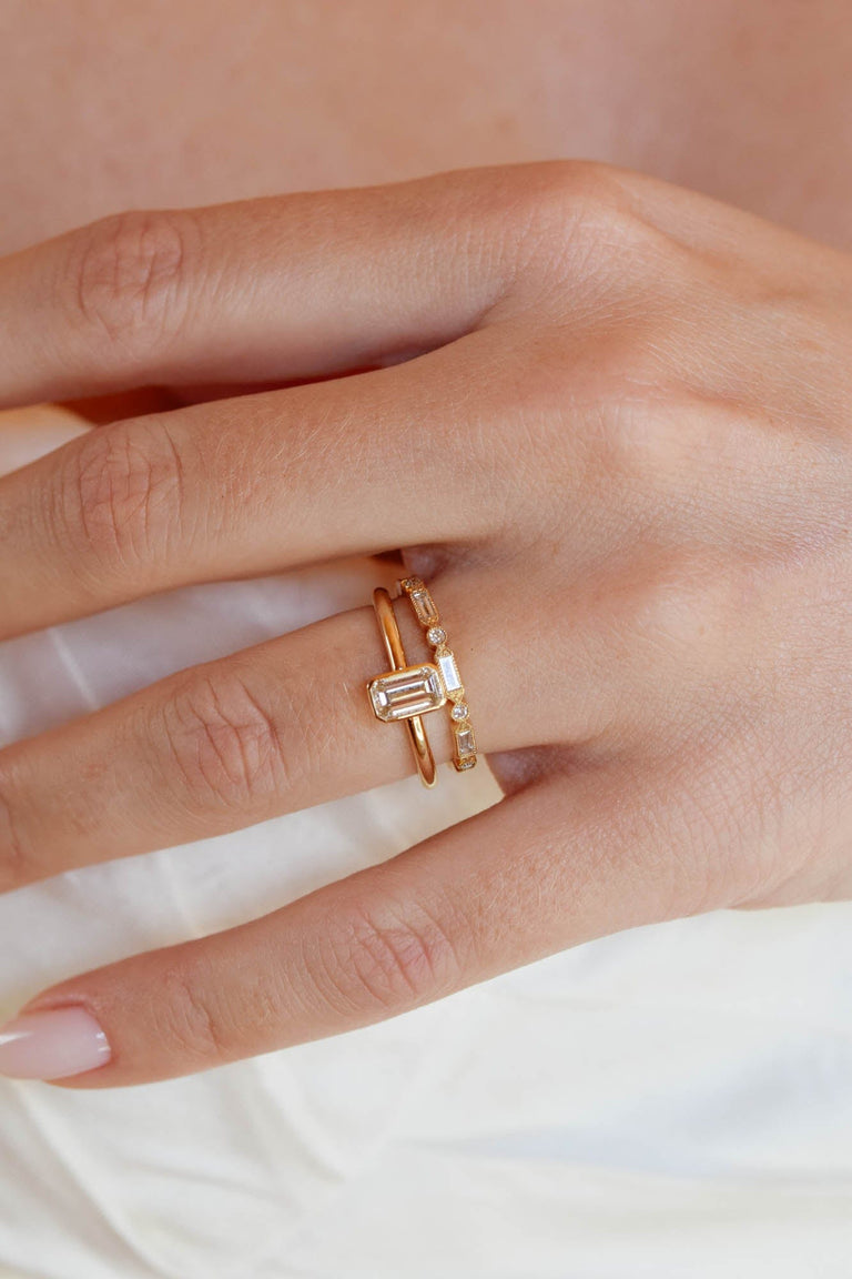 Classic Emerald Cut Diamond Bezel Solitaire .78