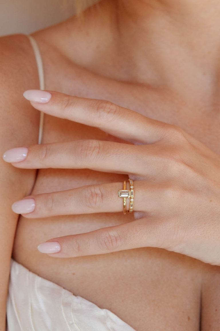 Classic Emerald Cut Diamond Bezel Solitaire .78