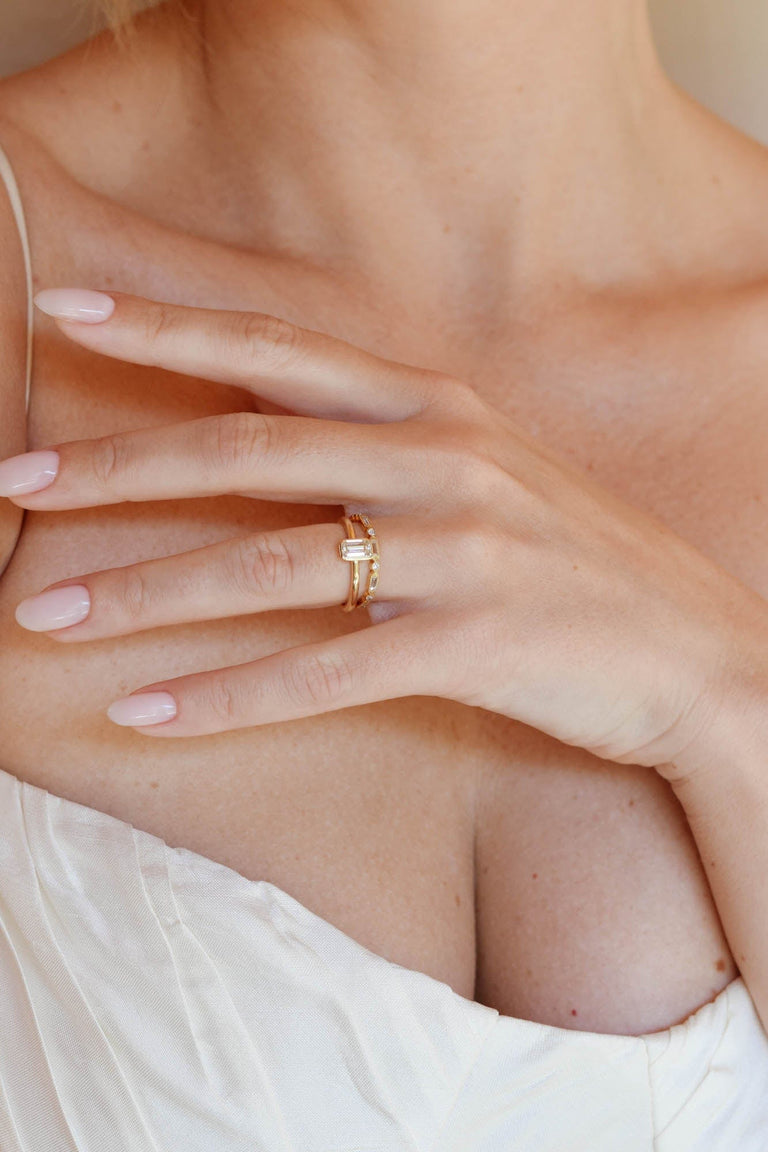 Classic Emerald Cut Diamond Bezel Solitaire .78