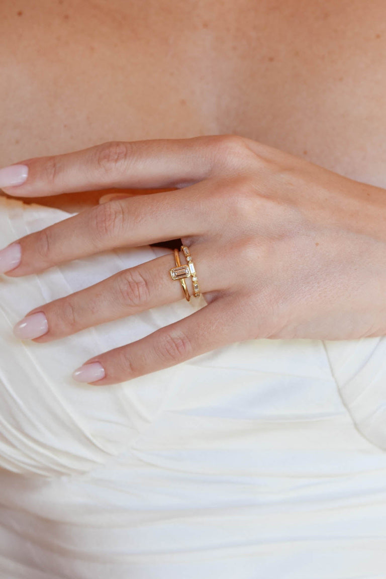 Classic Emerald Cut Diamond Bezel Solitaire .78