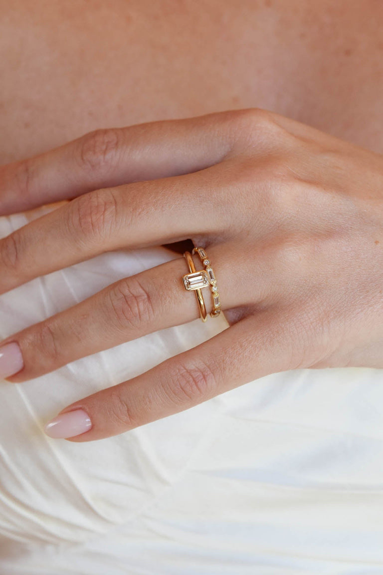 Classic Emerald Cut Diamond Bezel Solitaire .78