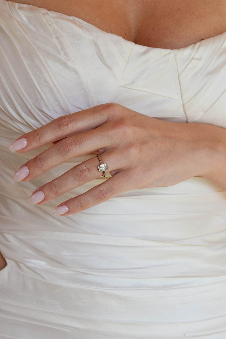 Classic Emerald Cut Diamond Bezel Solitaire 1.22