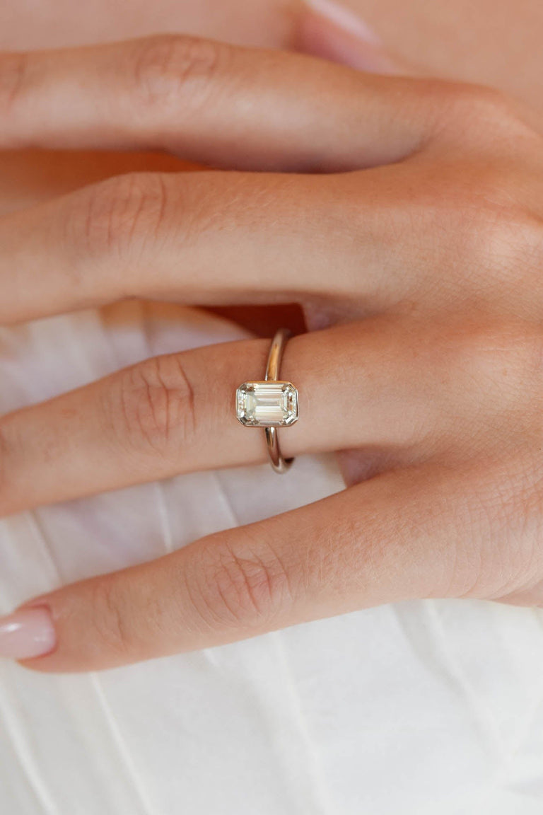 Classic Emerald Cut Diamond Bezel Solitaire 1.22