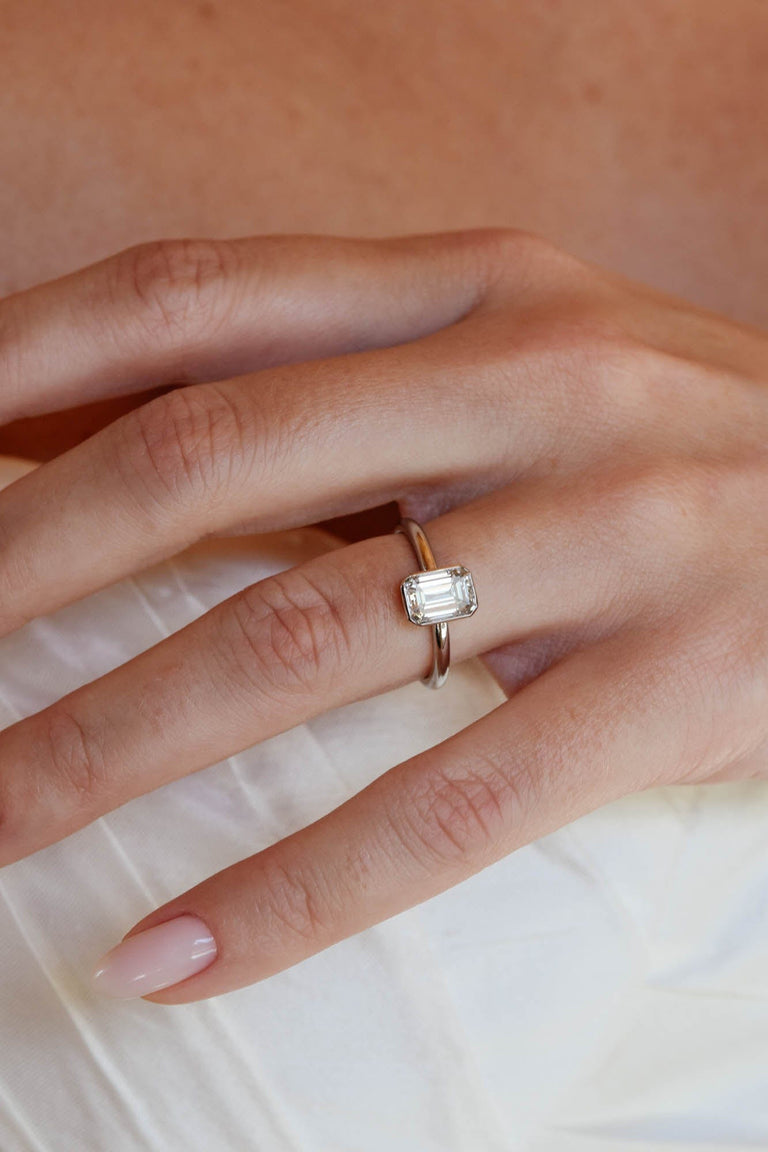 Classic Emerald Cut Diamond Bezel Solitaire 1.22