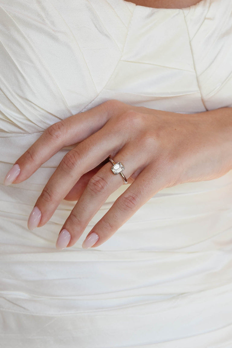 Classic Emerald Cut Diamond Bezel Solitaire 1.22