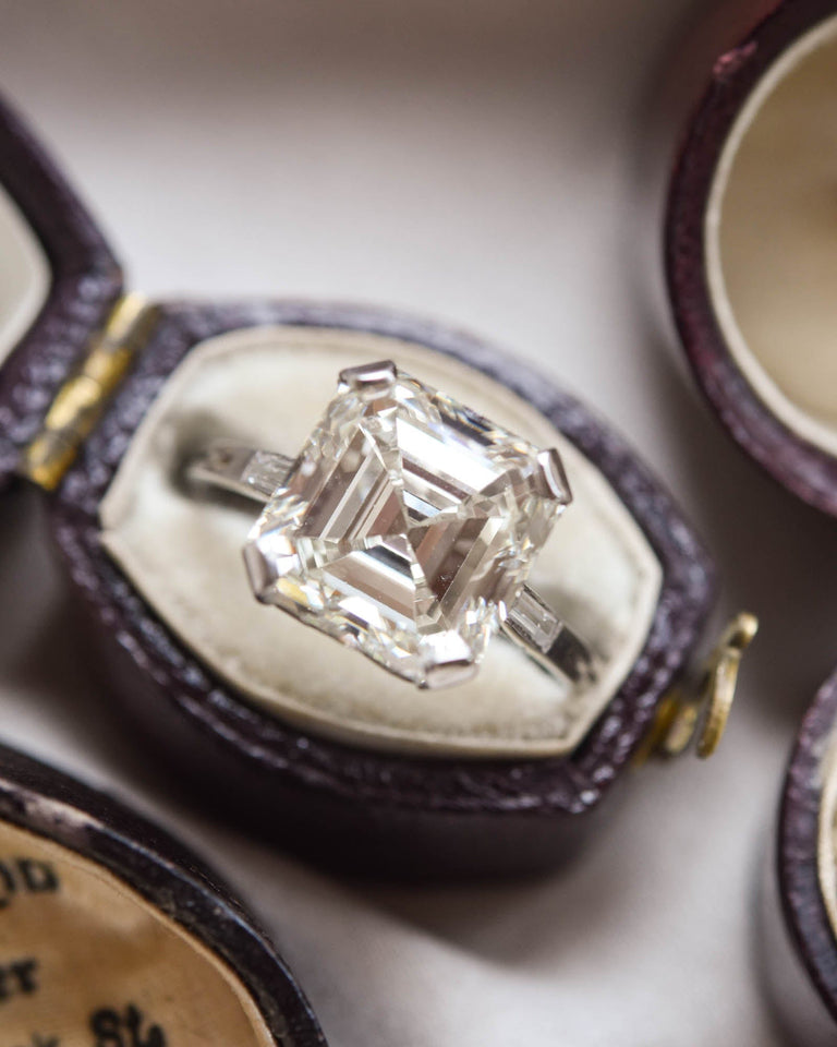 Expensive diamond ring in an antique ring box