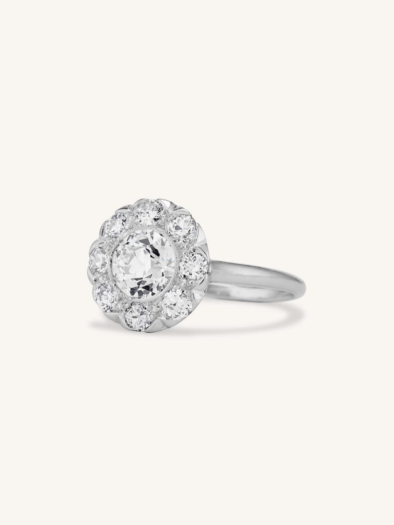 Late Art Deco 1.36 Carat Transitional Cut Diamond Cluster Engagement Ring