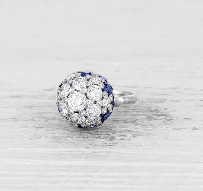 LATE ART DECO DIAMOND AND SAPPHIRE COCKTAIL RING