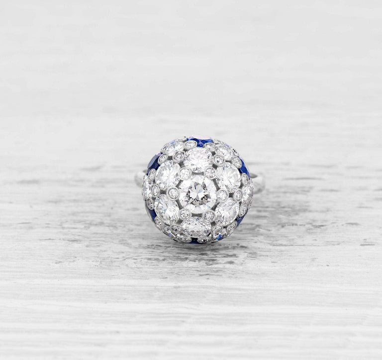 LATE ART DECO DIAMOND AND SAPPHIRE COCKTAIL RING