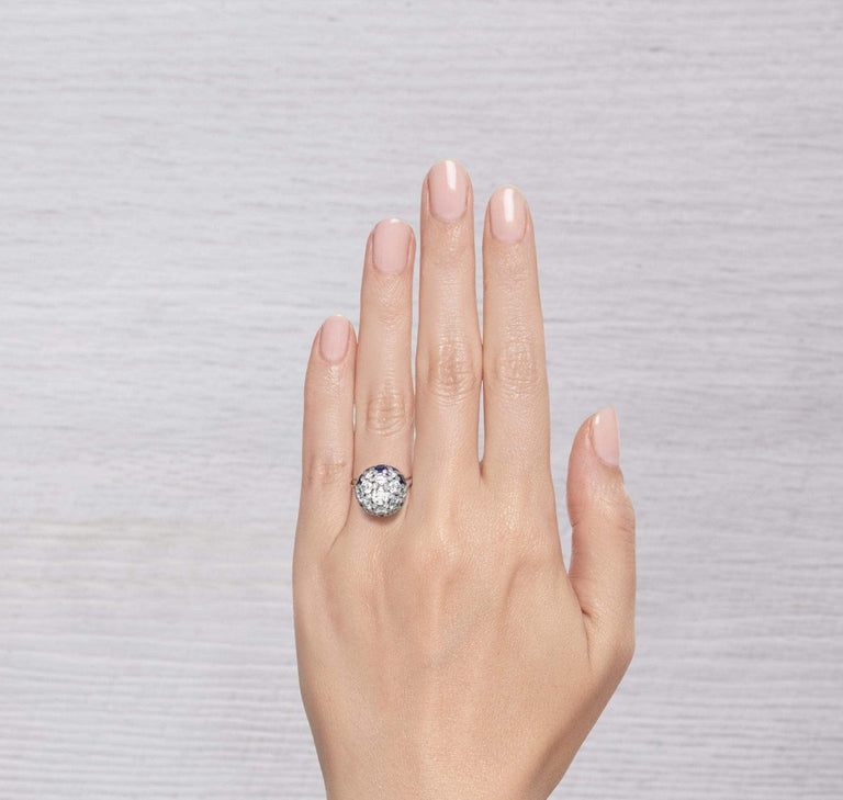LATE ART DECO DIAMOND AND SAPPHIRE COCKTAIL RING
