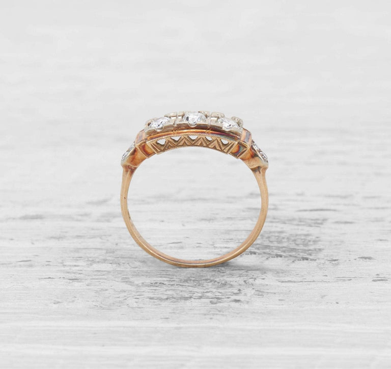 LATE ART DECO THREE STONE DIAMOND BAND