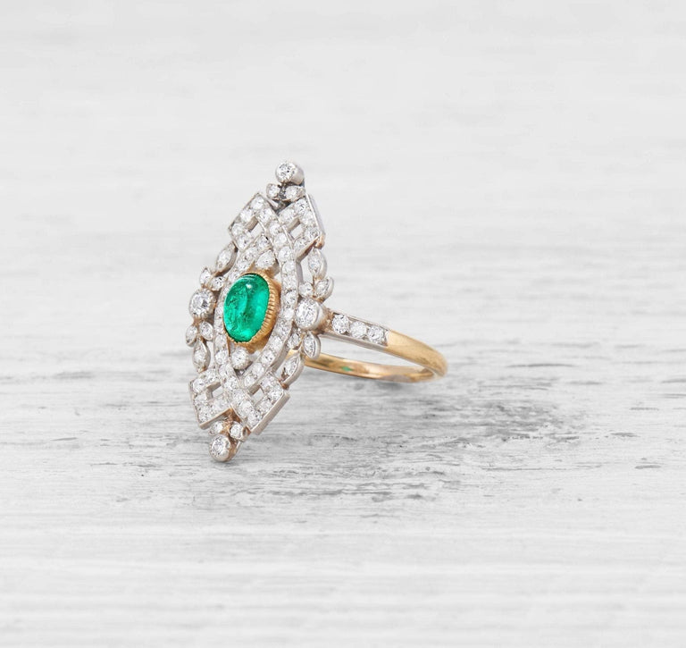 LATE EDWARDIAN EMERALD AND DIAMOND RING