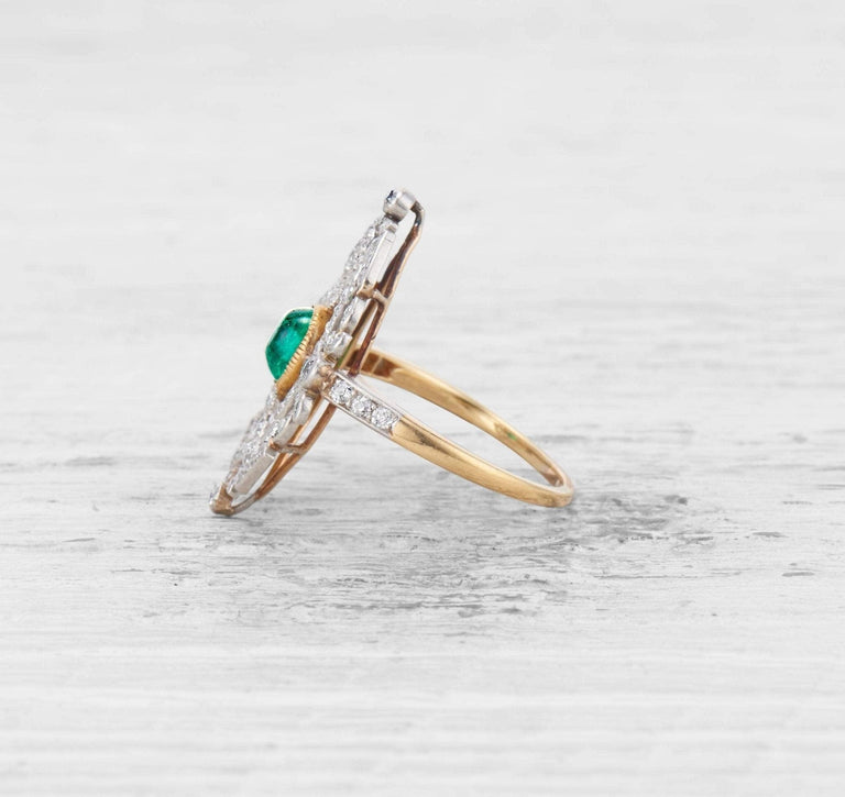 LATE EDWARDIAN EMERALD AND DIAMOND RING