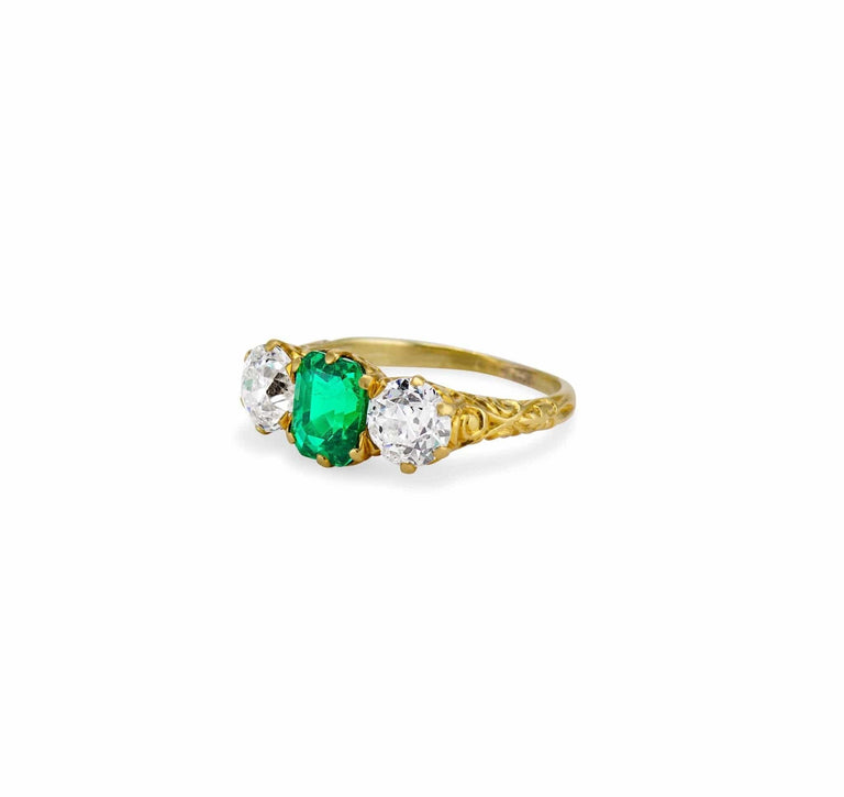 Victorian 1.48 Carat Colombian Emerald & Diamond Three Stone Carved Ring