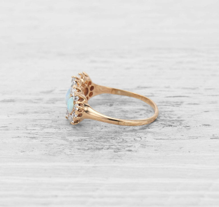 VICTORIAN THREE-STONE OPAL AND DIAMOND ENGAGEMENT RING