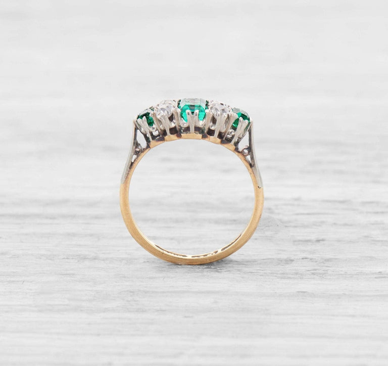 VINTAGE EMERALD AND DIAMOND ENGAGEMENT RING