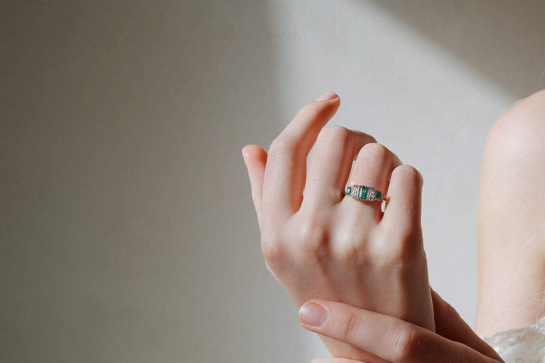 VINTAGE EMERALD AND DIAMOND ENGAGEMENT RING