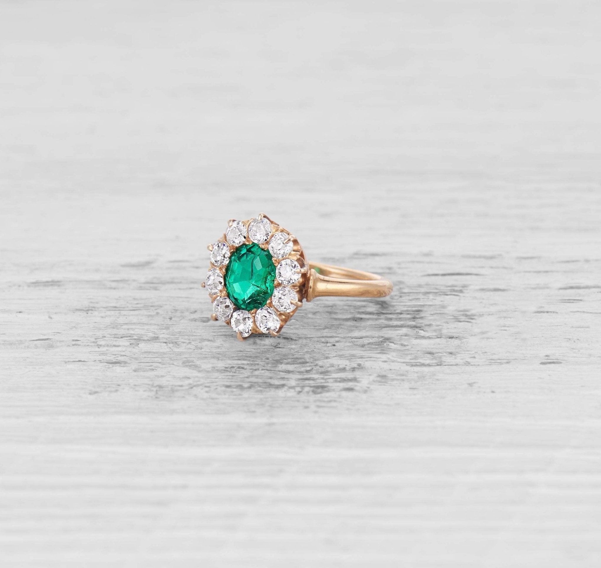 EMERALD AND DIAMOND CLUSTER ENGAGEMENT RING – Erstwhile Jewelry