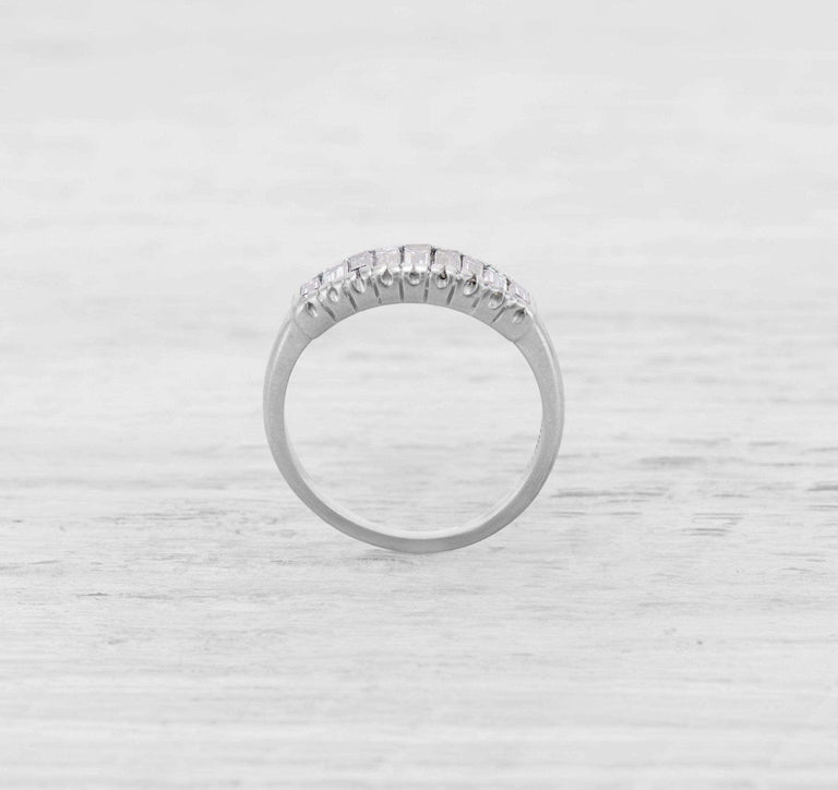 VINTAGE MID-CENTURY DIAMOND AND PLATINUM WEDDING BAND