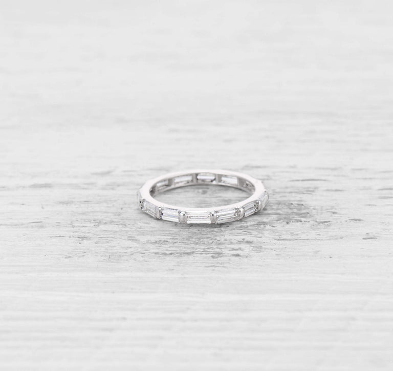 VINTAGE BAGUETTE CUT DIAMOND AND PLATINUM ETERNITY BAND