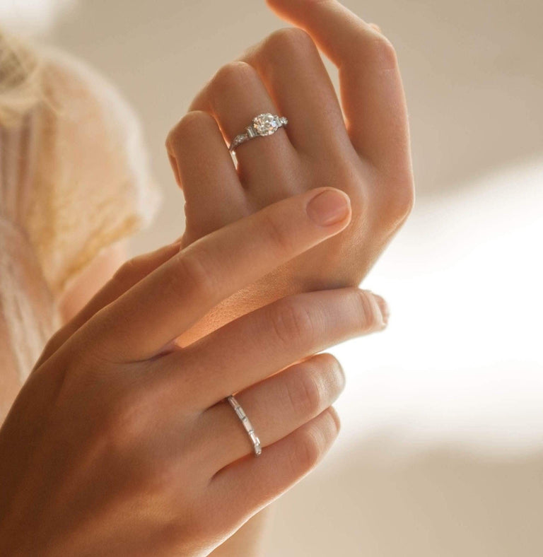 VINTAGE BAGUETTE CUT DIAMOND AND PLATINUM ETERNITY BAND